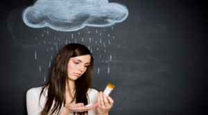 young woman against a chalkboard